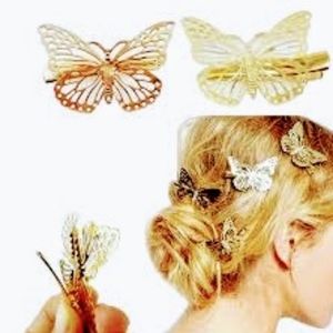 NWT Gold and Silver Tone Butterfly Clips.